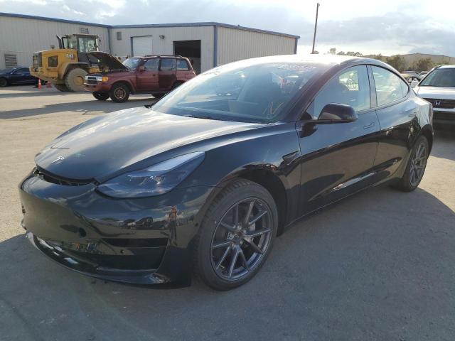 TESLA MODEL 3 2022 with VIN 5YJ3E1EBXNF290402 - Photo from auction