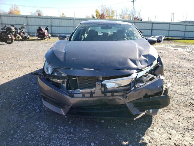 Photo 9 from auction – 2018 HONDA CIVIC LX with VIN 19XFC2F55JE203975