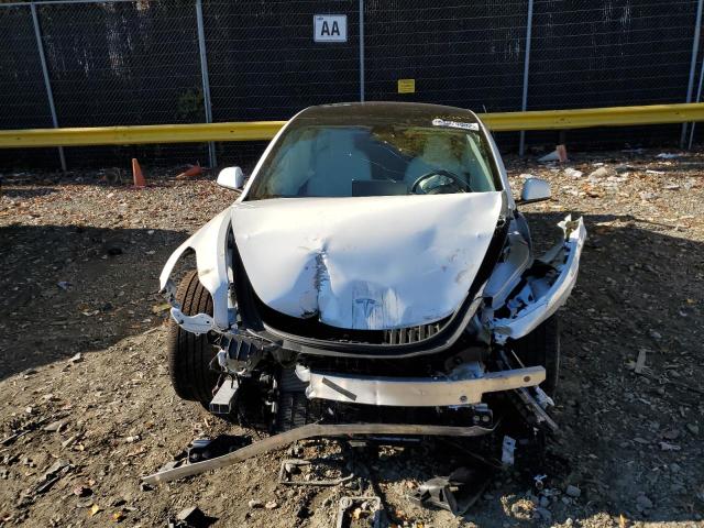 Photo 9 from auction – 2021 TESLA MODEL 3 with VIN 5YJ3E1EB9MF083806