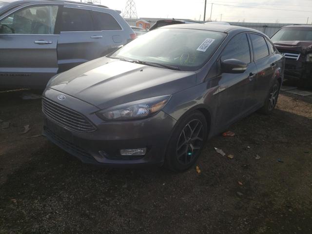 Photo 2 from auction – 2018 FORD FOCUS SE with VIN 1FADP3F21JL292058