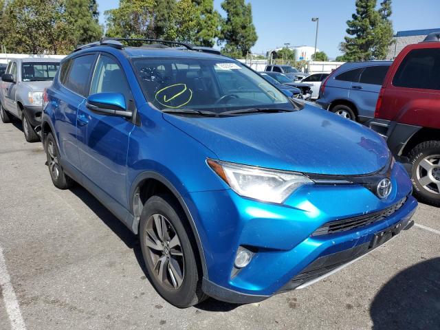 TOYOTA RAV4 XLE 2016 with VIN JTMWFREVXGJ097410 - Photo from auction