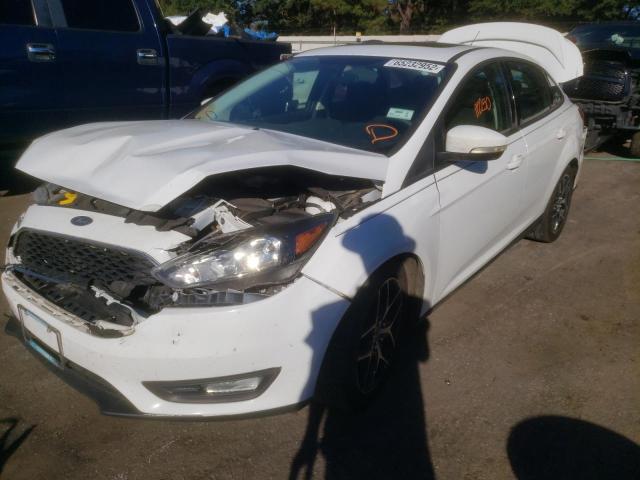 Photo 2 from auction – 2018 FORD FOCUS with VIN 1FADP3H26JL234668