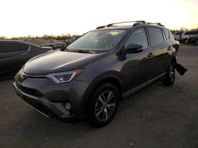 Photo 2 from auction – 2017 TOYOTA RAV4 XLE with VIN JTMWFREV4HJ145243