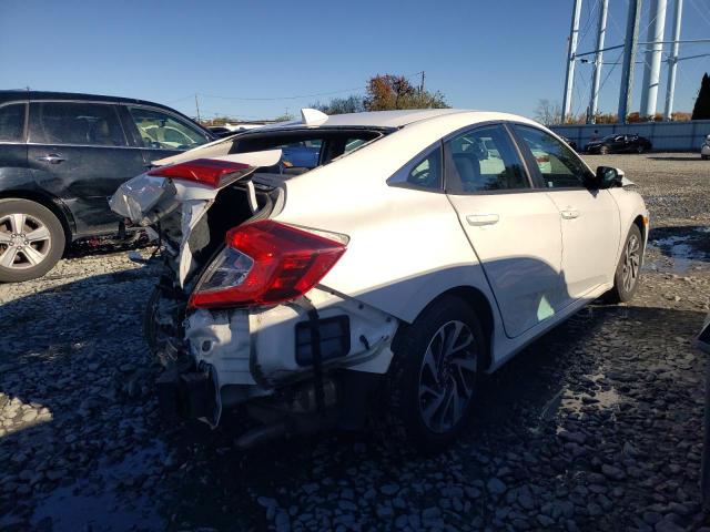 Photo 4 from auction – 2017 HONDA CIVIC EX with VIN 2HGFC2F70HH577704