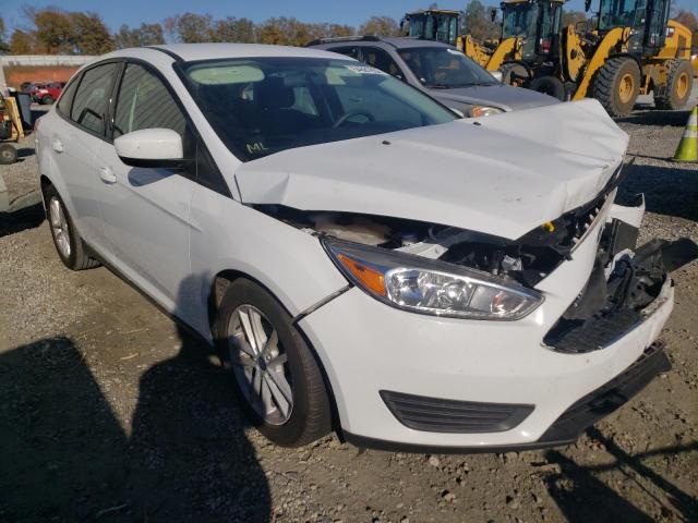 FORD FOCUS SE 2018 with VIN 1FADP3F22JL275348 - Photo from auction