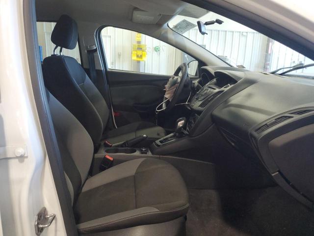Photo 5 from auction – 2013 FORD FOCUS S with VIN 1FADP3E23DL334137