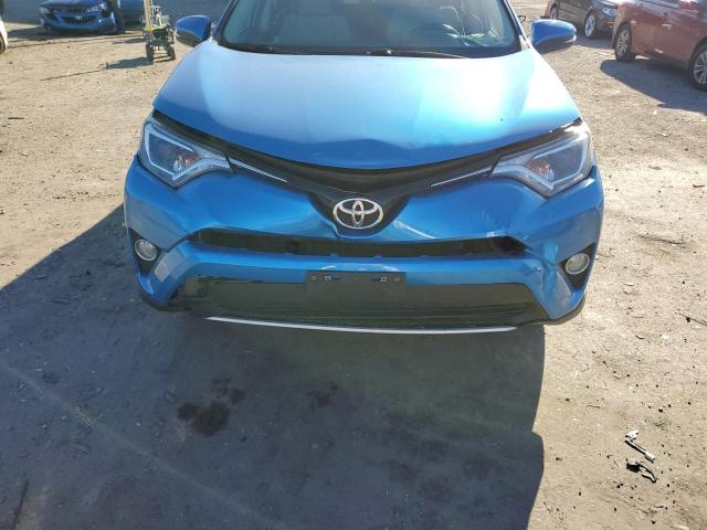 Photo 9 from auction – 2016 TOYOTA RAV4 XLE with VIN 2T3RFREV2GW479123