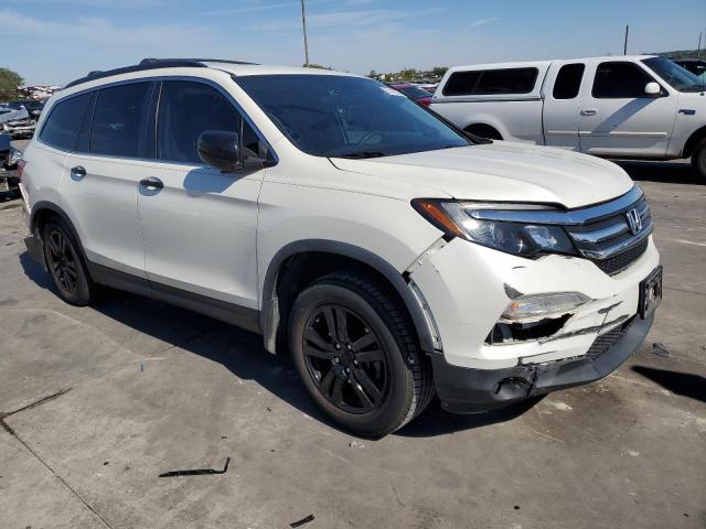 HONDA PILOT LX 2017 with VIN 5FNYF5H11HB033839 - Photo from auction
