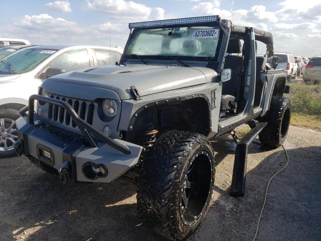 Photo 2 from auction – 2016 JEEP WRANGLER U with VIN 1C4BJWDG2GL199142