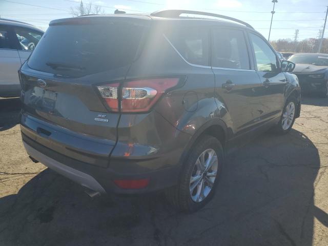 Photo 4 from auction – 2017 FORD ESCAPE SE with VIN 1FMCU0GDXHUD18296