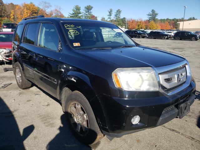 HONDA PILOT TOUR 2011 with VIN 5FNYF4H92BB015986 - Photo from auction