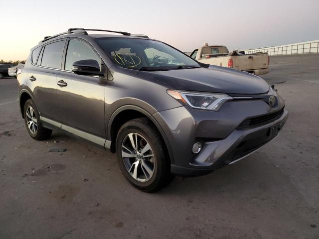 TOYOTA RAV4 XLE 2017 with VIN JTMWFREV4HJ145243 - Photo from auction