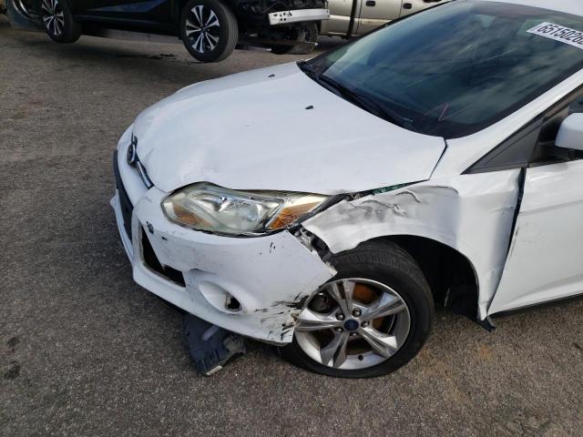 Photo 9 from auction – 2014 FORD FOCUS SE with VIN 1FADP3F24EL140510