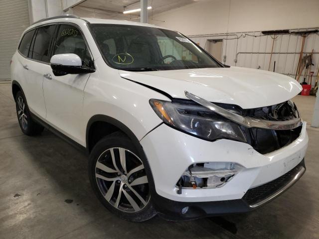 Photo 1 from auction – 2016 HONDA PILOT TOUR with VIN 5FNYF6H95GB040237