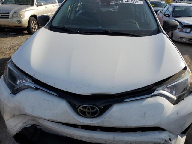 Photo 7 from auction – 2018 TOYOTA RAV4 LE with VIN JTMZFREV1JJ746483