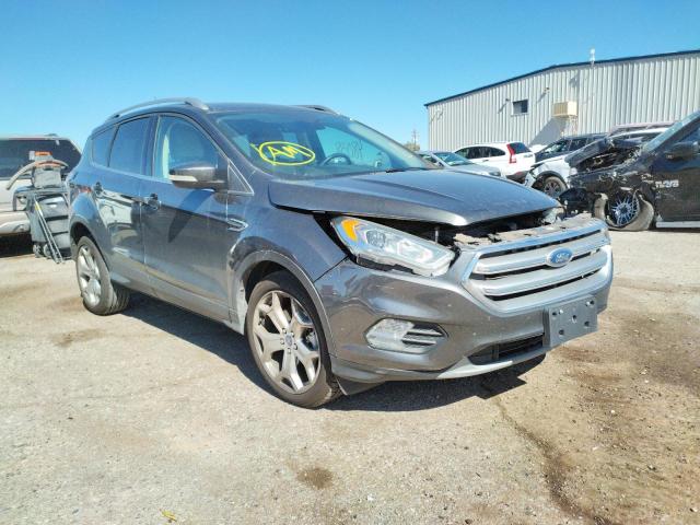 FORD ESCAPE TIT 2017 with VIN 1FMCU0J94HUB66908 - Photo from auction