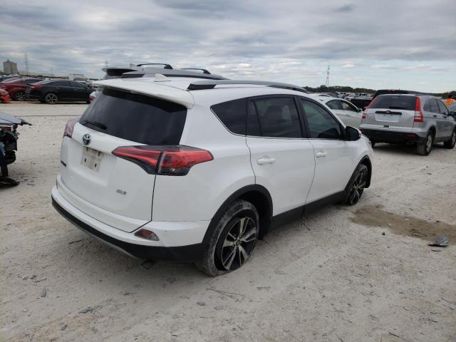 Photo 4 from auction – 2017 TOYOTA RAV4 XLE with VIN 2T3WFREV1HW389868