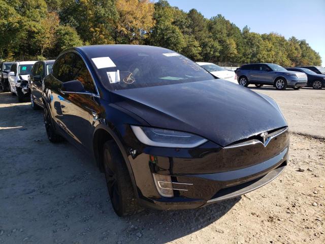 TESLA MODEL X 2018 with VIN 5YJXCBE2XJF112173 - Photo from auction