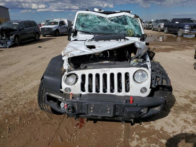 Photo 9 from auction – 2016 JEEP WRANGLER U with VIN 1C4BJWFG9GL243005