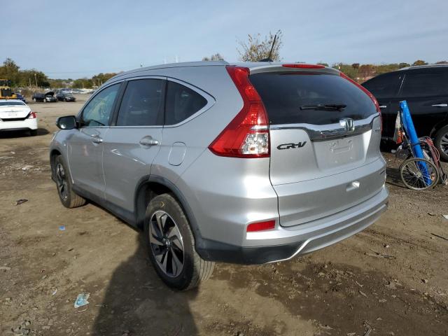 Photo 3 from auction – 2015 HONDA CR-V TOURI with VIN 5J6RM4H94FL111707
