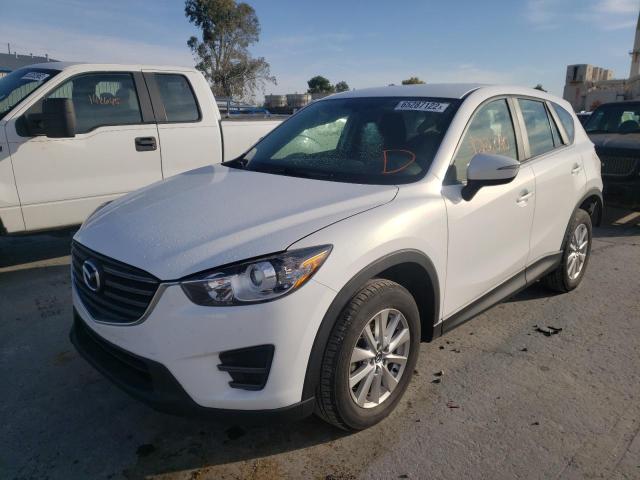 Photo 2 from auction – 2016 MAZDA CX-5 SPORT with VIN JM3KE2BY0G0854898