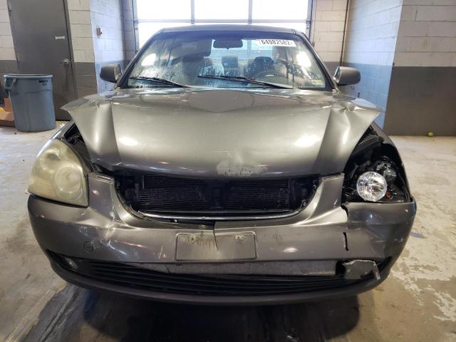 Photo 9 from auction – 2007 KIA OPTIMA LX with VIN KNAGE123275138792