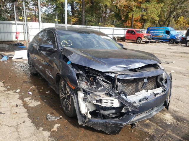 HONDA CIVIC EX 2018 with VIN JHMFC1F34JX005430 - Photo from auction