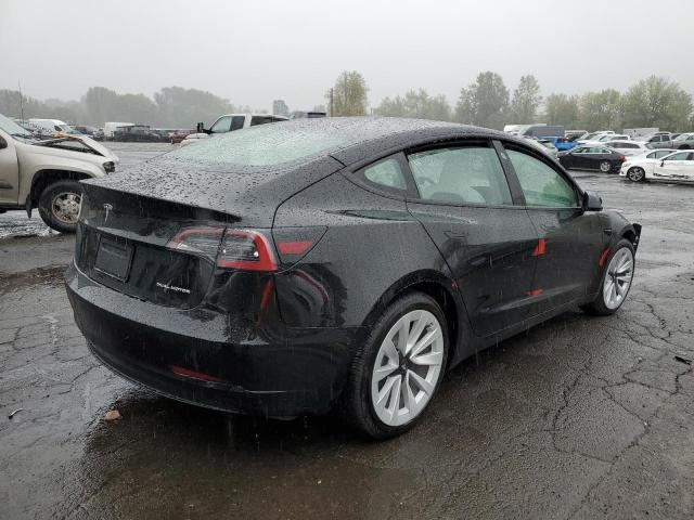 Photo 4 from auction – 2022 TESLA MODEL 3 with VIN 5YJ3E1EBXNF347486