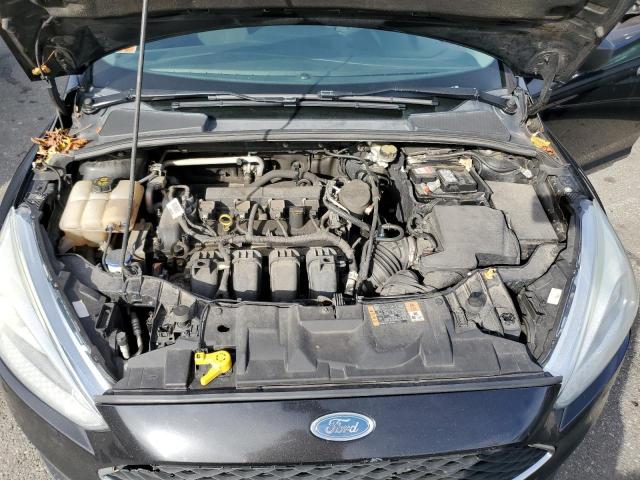 Photo 7 from auction – 2015 FORD FOCUS S with VIN 1FADP3E24FL264229