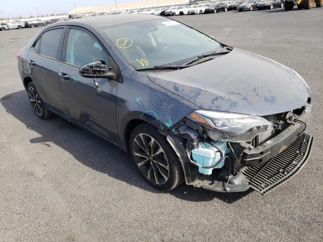 TOYOTA COROLLA L 2017 with VIN 5YFBURHE4HP702096 - Photo from auction