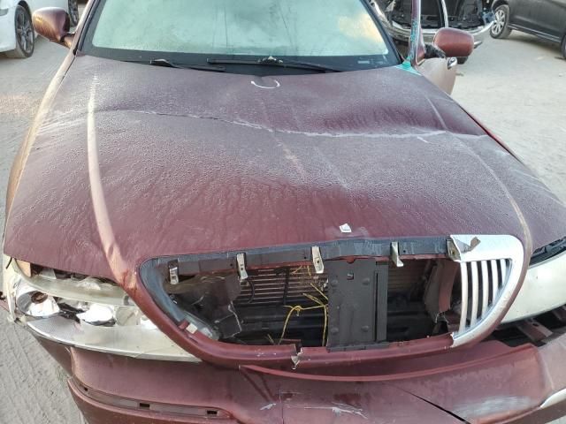 Photo 7 from auction – 2004 LINCOLN TOWN CAR E with VIN 1LNHM81W34Y638190