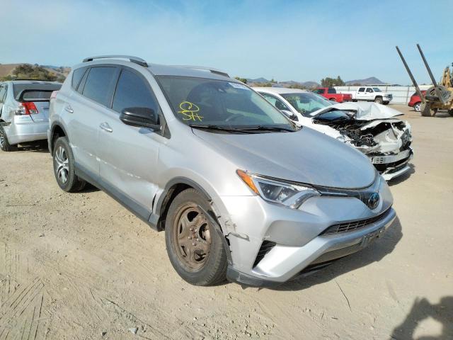 Photo 1 from auction – 2018 TOYOTA RAV4 LE with VIN JTMZFREVXJJ190657