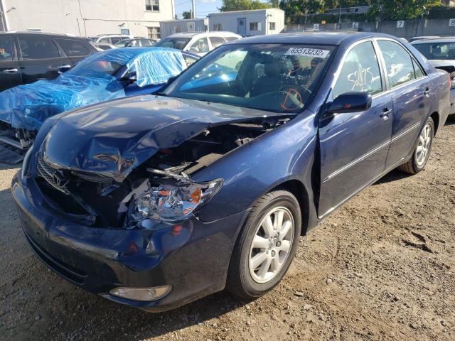 Photo 2 from auction – 2004 TOYOTA CAMRY LE with VIN 4T1BF30K44U079144