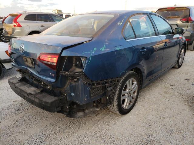 Photo 4 from auction – 2017 VOLKSWAGEN JETTA S with VIN 3VW2B7AJ5HM303638
