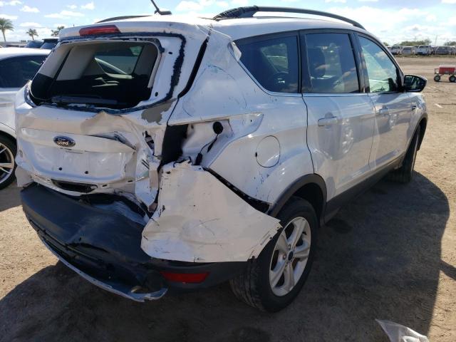 Photo 4 from auction – 2016 FORD ESCAPE SE with VIN 1FMCU0GX7GUC77036