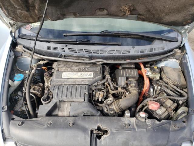 Photo 7 from auction – 2006 HONDA CIVIC HYBR with VIN JHMFA36276S016063
