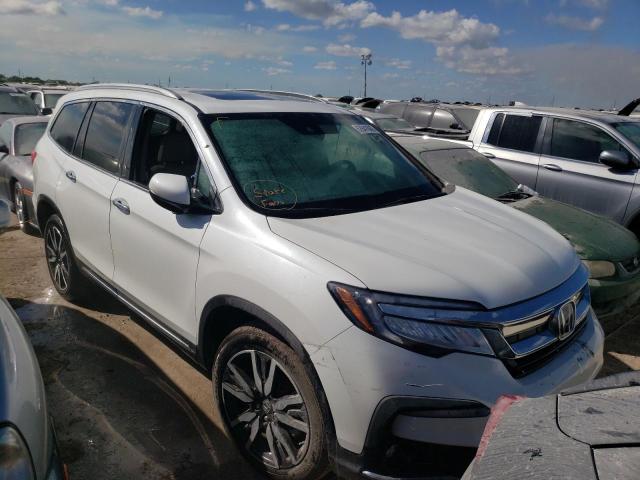 HONDA PILOT TOUR 2022 with VIN 5FNYF6H6XNB034288 - Photo from auction