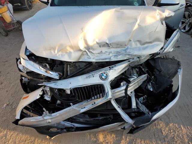 Photo 7 from auction – 2017 BMW 320 I with VIN WBA8E1G37HNU17671