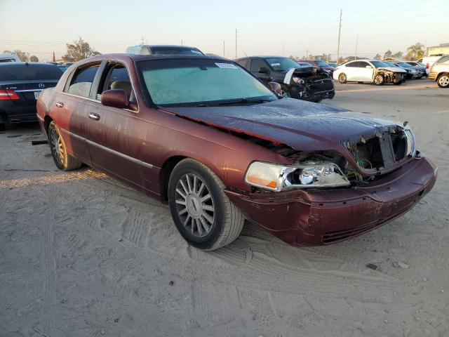 Photo 1 from auction – 2004 LINCOLN TOWN CAR E with VIN 1LNHM81W34Y638190