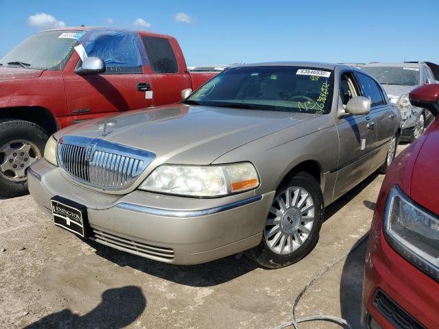 Photo 2 from auction – 2004 LINCOLN TOWN CAR E with VIN 1LNHM81W34Y654311