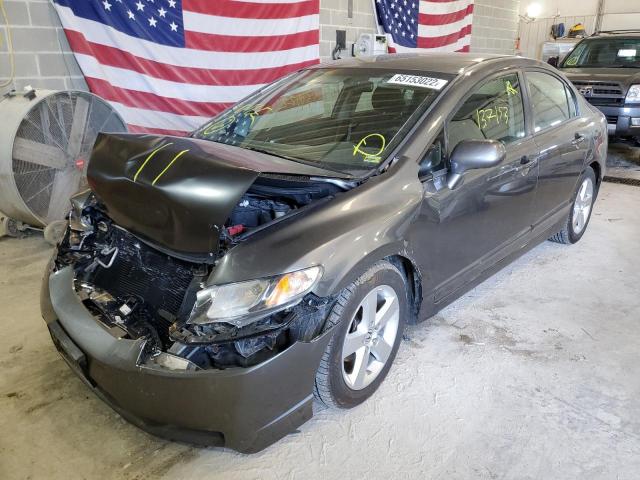 Photo 2 from auction – 2011 HONDA CIVIC LX-S with VIN 19XFA1F66BE007070
