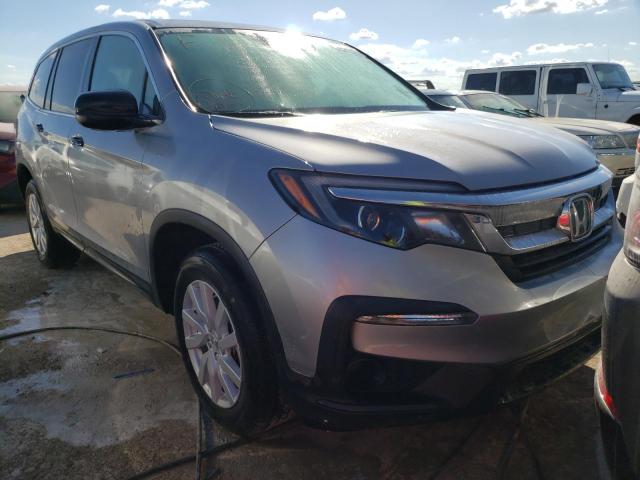 HONDA PILOT LX 2019 with VIN 5FNYF5H10KB014335 - Photo from auction