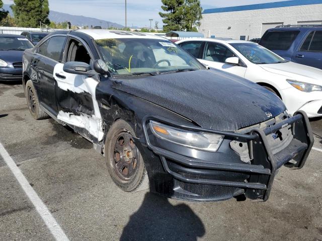 FORD TAURUS POL 2015 with VIN 1FAHP2MK2FG165205 - Photo from auction
