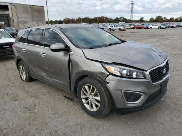 KIA SORENTO LX 2016 with VIN 5XYPG4A30GG104793 - Photo from auction