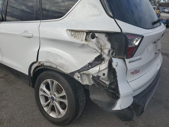 Photo 9 from auction – 2017 FORD ESCAPE SE with VIN 1FMCU0GD4HUA09066