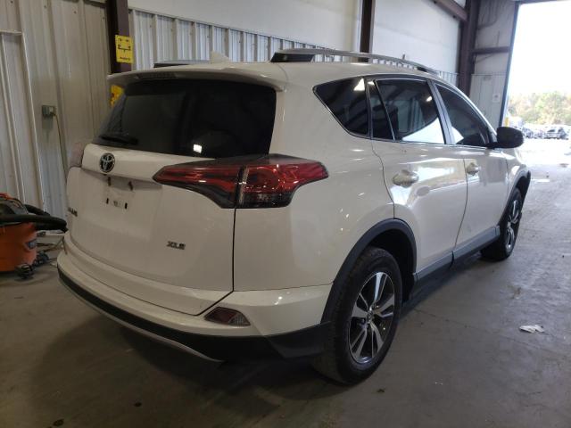 Photo 4 from auction – 2016 TOYOTA RAV4 XLE with VIN 2T3WFREV4GW258528