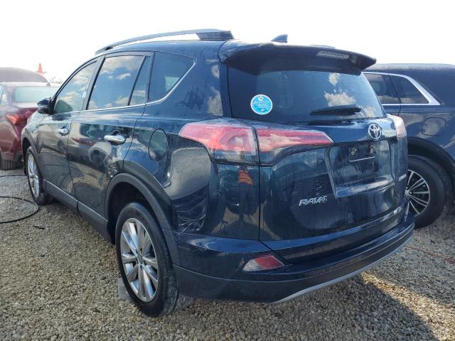 Photo 3 from auction – 2018 TOYOTA RAV4 LIMIT with VIN 2T3YFREV7JW482182
