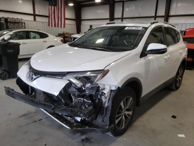 Photo 2 from auction – 2016 TOYOTA RAV4 XLE with VIN 2T3WFREV4GW258528