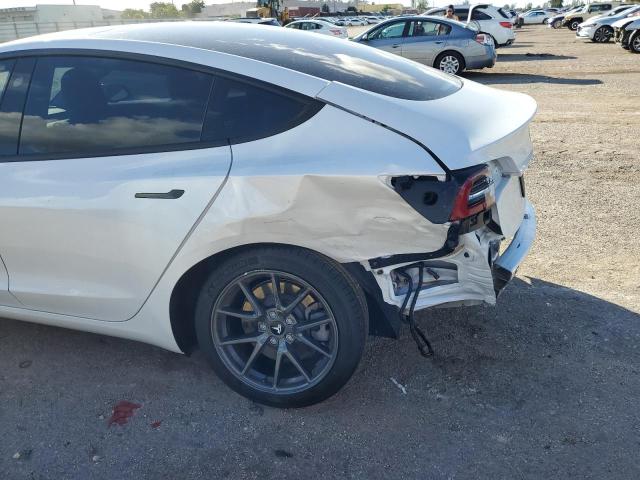 Photo 9 from auction – 2021 TESLA MODEL 3 with VIN 5YJ3E1EA5MF907890