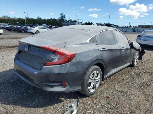 Photo 4 from auction – 2018 HONDA CIVIC LX with VIN 19XFC2F53JE037634